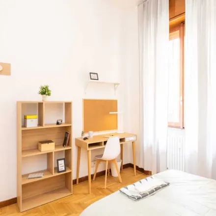 Rent this 4 bed room on Via Friuli in 42, 20135 Milan MI