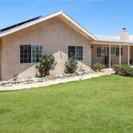 Buy this 4 bed house on 11032 Anderson Ranch Rd in Phelan, California