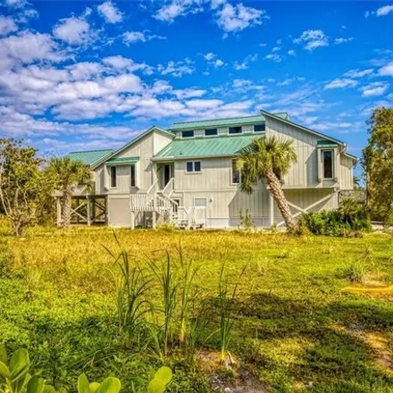 Buy this 4 bed house on 4416 Gulf Pines Drive in Sanibel, Lee County