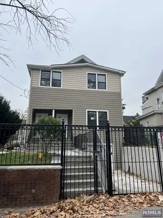 Buy this 7 bed house on Auto Lease LLC NJ in 624 East 25th Street, Paterson