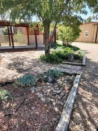 Buy this 3 bed house on 513 Agua Fria Street in Santa Fe, NM 87501