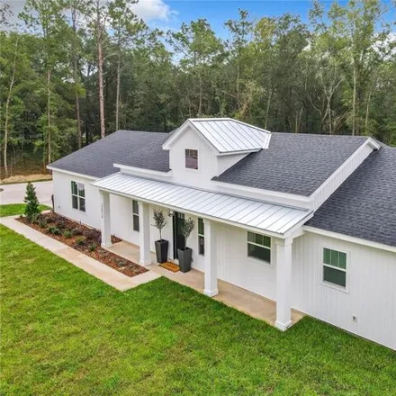 Buy this 3 bed house on 5849 Southwest 129th Terrace Road in Marion County, FL 34481
