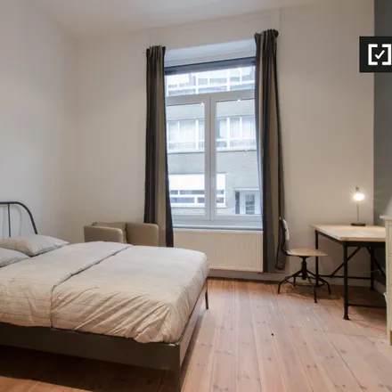 Rent this 8 bed room on Avenue Adolphe Buyl - Adolphe Buyllaan 48 in 1050 Ixelles - Elsene, Belgium