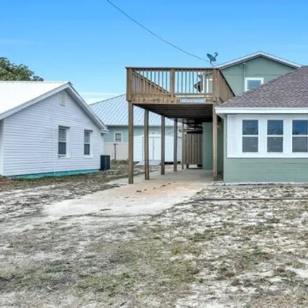 Buy this 5 bed house on 14000 Millcole Avenue in Bid-A-Wee, Panama City Beach