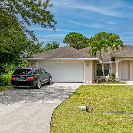 Buy this 4 bed house on 3674 Southwest Margela Street in Port Saint Lucie, FL 34953