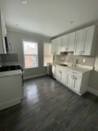 Rent this 4 bed apartment on 249 Cambridge Street in Boston, MA 02134