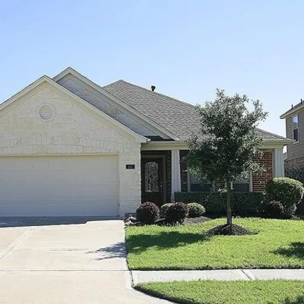 Rent this 4 bed house on 884 Sierra Brook Lane in League City, TX 77573