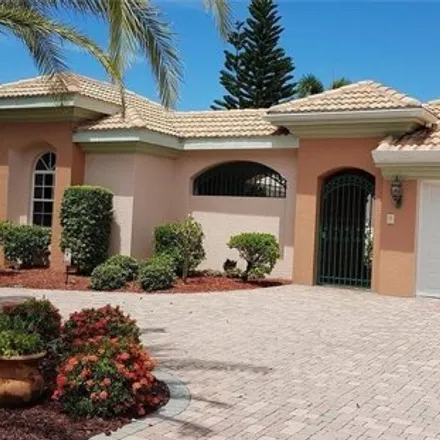 Rent this 4 bed house on 9799 Mar Largo Circle in Lee County, FL 33919
