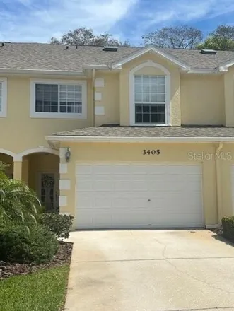 Buy this 3 bed townhouse on 3496 Fox Hunt Drive in Palm Harbor, FL 34683