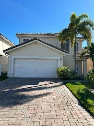 Rent this 3 bed house on 6025 Adriatic Way in Lake Belvedere Estates, Palm Beach County