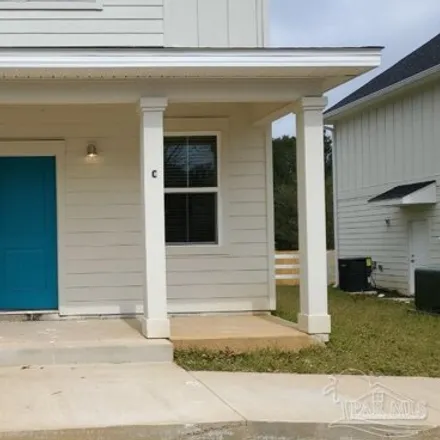 Rent this 4 bed house on 9878 Utopia Drive in Ferry Pass, FL 32514