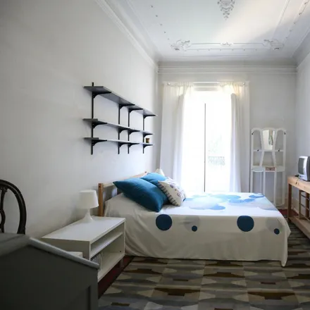 Rent this 4 bed room on Rua de São Mamede 16A in 1100-059 Lisbon, Portugal