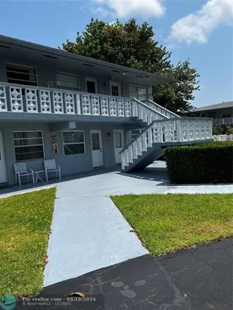 Rent this 2 bed condo on 749 Pine Drive in Cypress Isles Estates, Pompano Beach