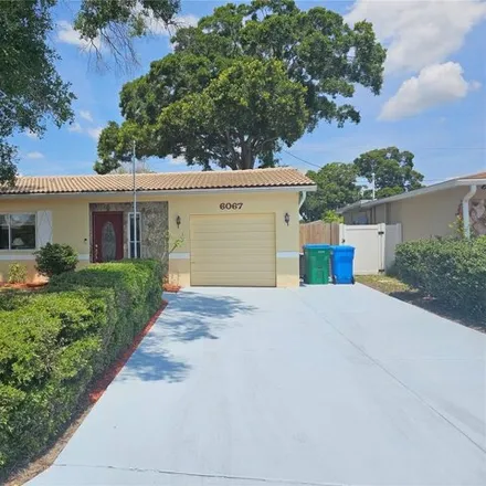 Buy this 4 bed house on 6085 43rd Terrace North in Pinellas County, FL 33709