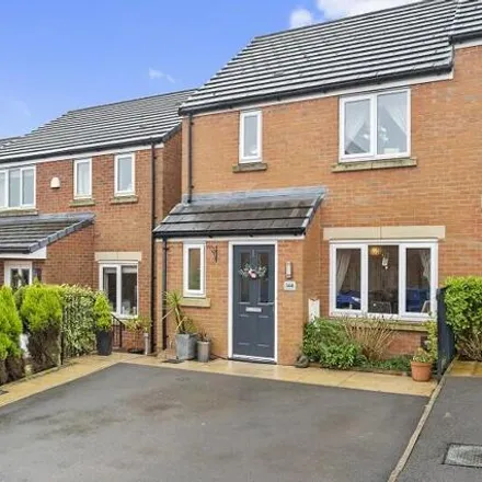 Buy this 3 bed townhouse on Hartley Green Gardens in Far Moor, WN5 7GA
