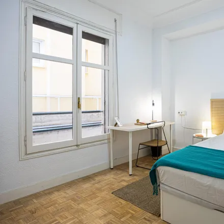 Rent this 6 bed room on Plaza del Conde del Valle de Suchil in 12, 28015 Madrid