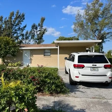 Rent this 3 bed house on 1501 Avenue H West in Riviera Beach, FL 33404