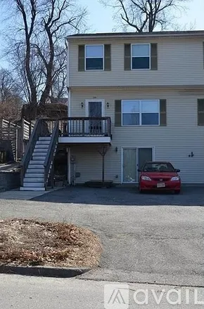 Rent this 3 bed townhouse on 130 Norfolk St