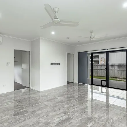 Rent this 4 bed apartment on Thornbush Street in Mount Low QLD 4818, Australia