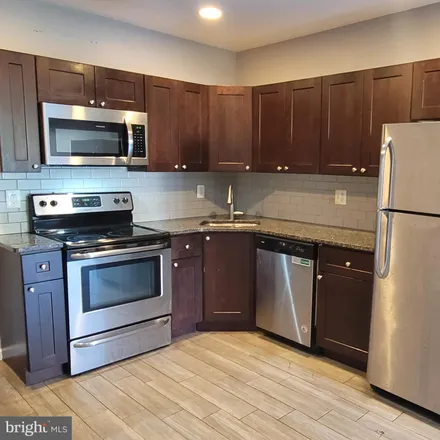 Rent this 4 bed townhouse on 2261 North Park Avenue in Philadelphia, PA 19132