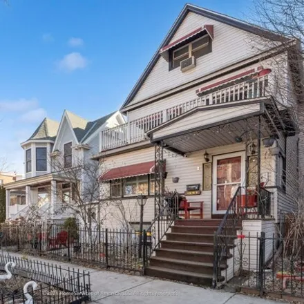 Buy this 8 bed house on 1907 West Cuyler Avenue in Chicago, IL 60613