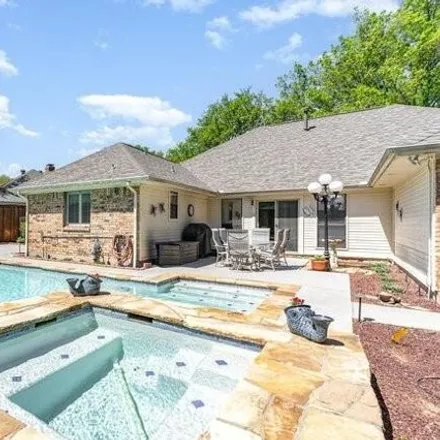 Buy this 4 bed house on 2922 Oak Springs Drive in Garland, TX 75044
