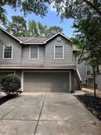 Rent this 3 bed townhouse on 127 Anise Tree Pl in The Woodlands, Texas