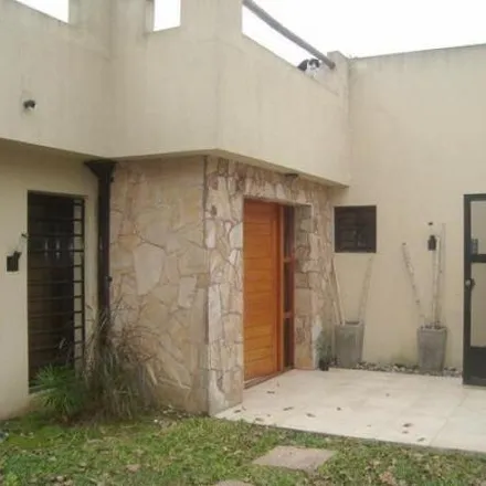 Buy this 4 bed house on Calle 313 in Partido de Berazategui, B1880 BFG Ranelagh