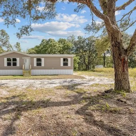Buy this studio apartment on 14062 NW 72 TER in Levy County, FL 32693