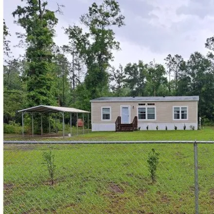 Buy this studio apartment on 287 Southwest Albany Terrace in Columbia County, FL 32038