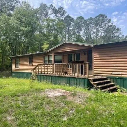 Buy this studio apartment on 19301 Cotton Patch Road in Leon County, FL 32310