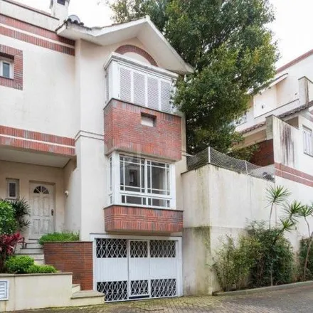 Buy this 3 bed house on Avenida Copacabana in Vila Assunção, Porto Alegre - RS