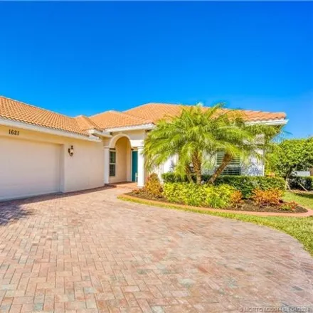 Buy this 2 bed house on 1643 Northwest Old Oak Trail in Jensen Beach, FL 34957