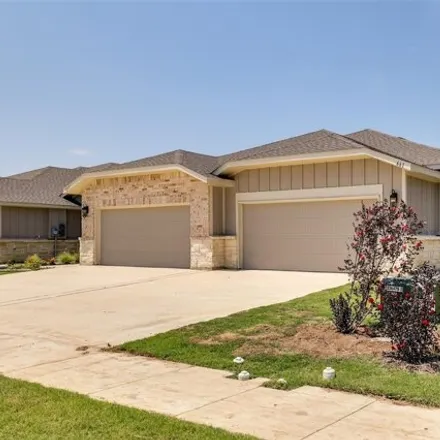 Rent this 3 bed house on 661 Blackland Dr in Venus, Texas