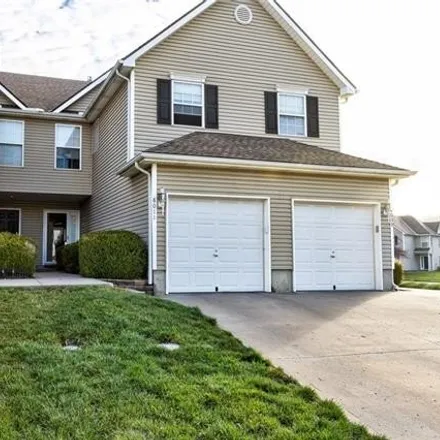 Buy this 2 bed townhouse on 8025 North Elmwood Avenue in Kansas City, MO 64119