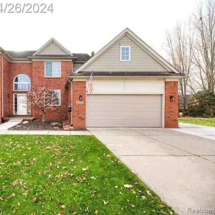 Buy this 4 bed house on 3179 Thimbleberry Court in Wixom, MI 48393
