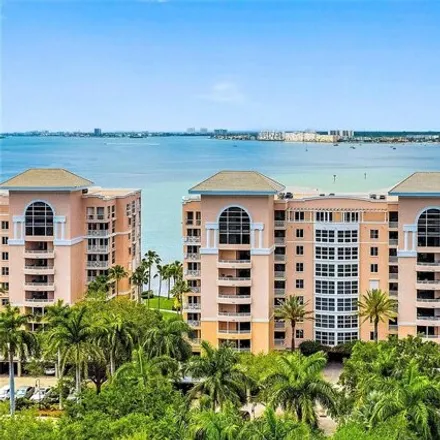 Buy this 2 bed condo on Summerland in Bacopa Lane South, Bayway Isles