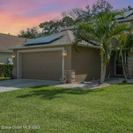 Buy this 5 bed house on 1665 Sawgrass Drive in Palm Bay, FL 32908