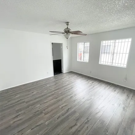 Rent this 3 bed apartment on 1641 West 51st Street in Los Angeles, CA 90062