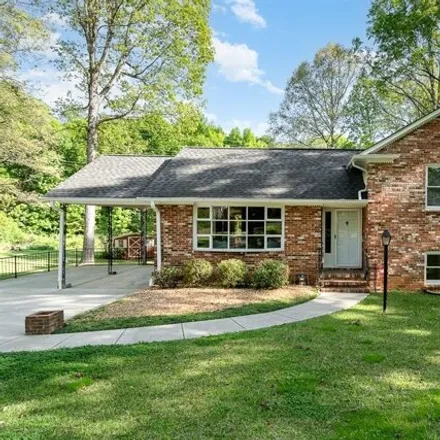 Buy this 4 bed house on 1148 Cedarwood Lane in Charlotte, NC 28212