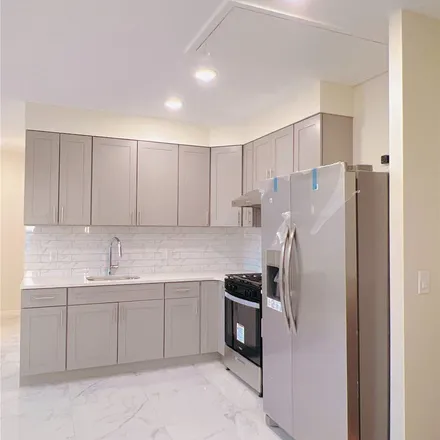 Rent this 4 bed apartment on 87-28 92nd Street in New York, NY 11421