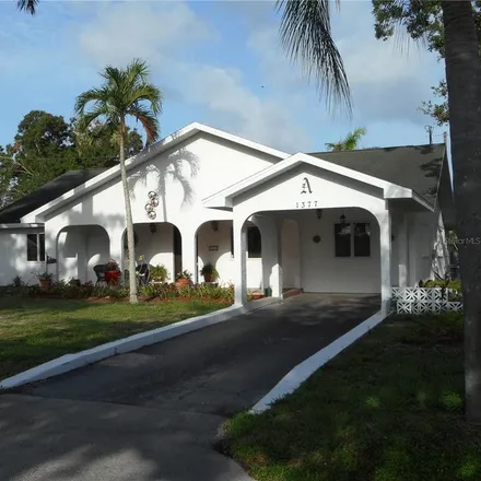 Rent this 3 bed house on 1377 11th Street North in Naples, FL 34102