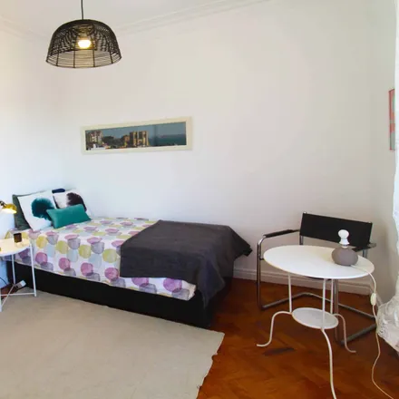 Rent this 6 bed room on Rua Leite de Vasconcelos 77 in 1170-379 Lisbon, Portugal