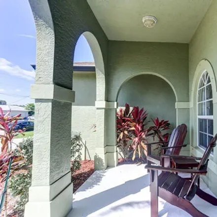 Buy this 4 bed house on 945 Southwest Fable Avenue in Port Saint Lucie, FL 34953