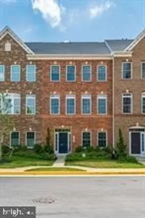Buy this 4 bed house on 13701 Neil Armstrong Avenue in Sully Square, Fairfax County