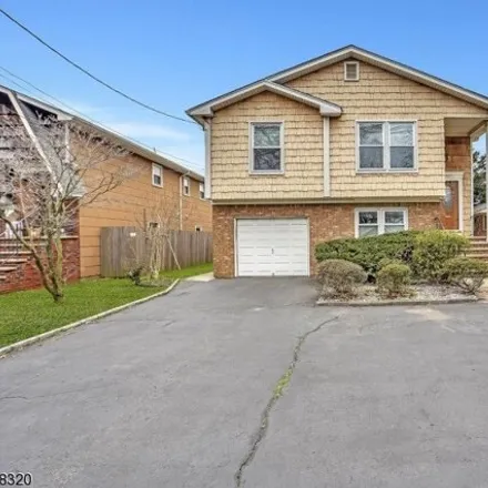 Rent this 3 bed house on Wood Avenue in Roselle, NJ 07203
