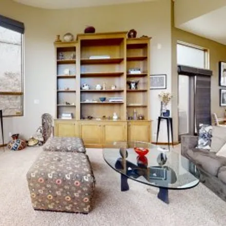Buy this 3 bed apartment on 5209 Foothills Trl Northeast in Northeast Albuquerque, Albuquerque