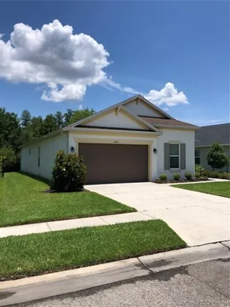Rent this 4 bed house on 4660 Rolling Greene Drive in Pasco County, FL 33543