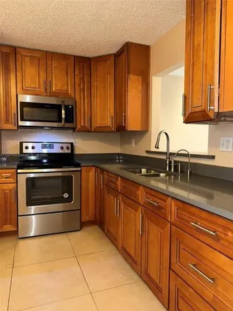 Rent this 2 bed condo on Northwest 66th Avenue in Plantation Gardens, Plantation