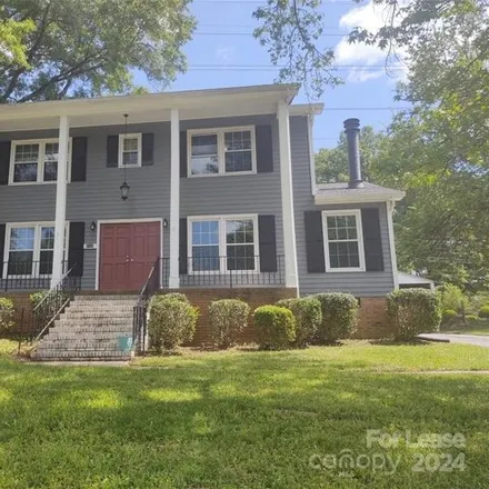 Rent this 4 bed house on 6000 Doncaster Drive in Charlotte, NC 28211